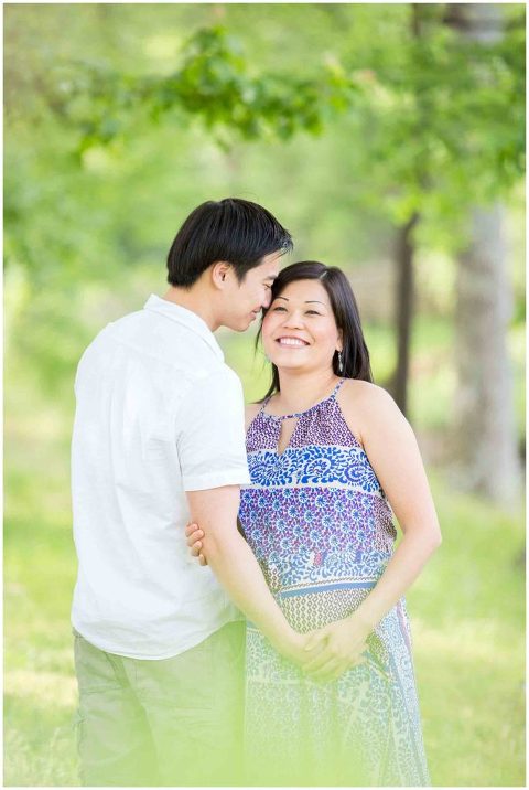 lifestyle maternity session photograph with husband and wife 7 months pregnant