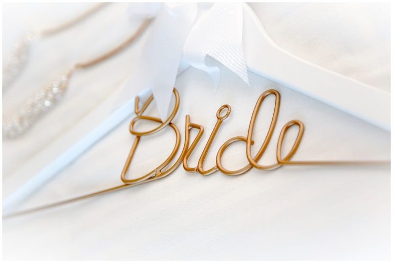 gold and white bride hanger