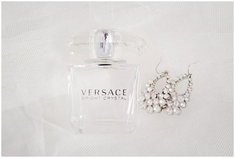 Versace perfume and diamond earrings